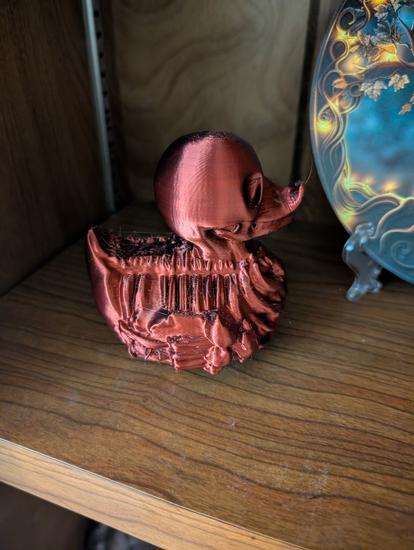 Crimson Skeleton Duck Figurine