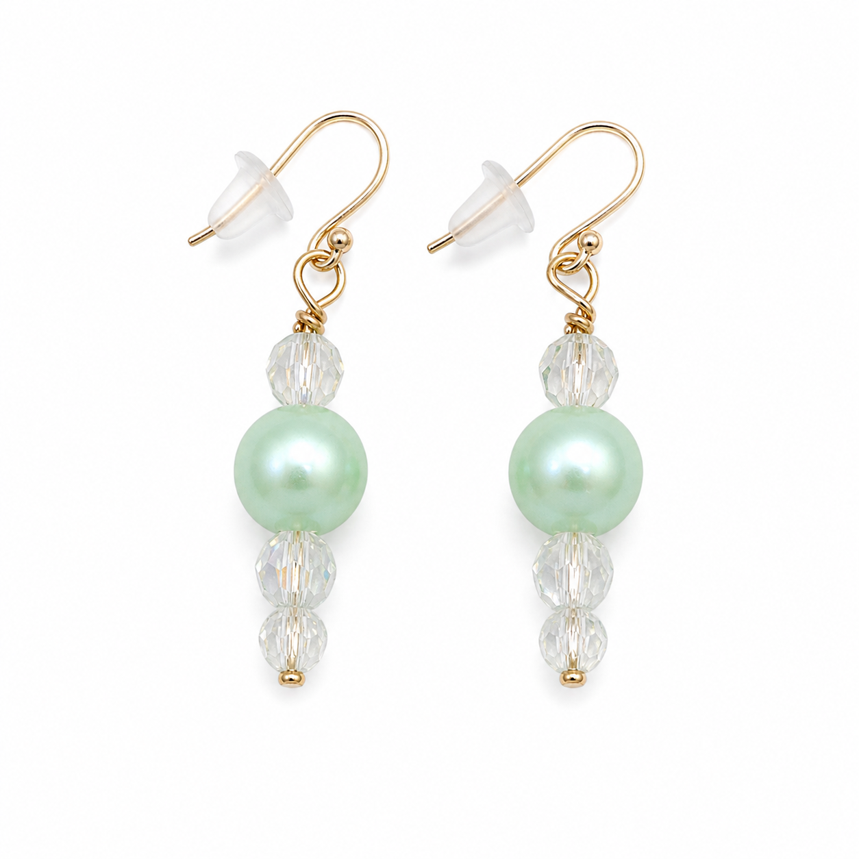 Mint green pearl drop earrings with clear crystal beads gold hooks handmade lightweight jewelry white background