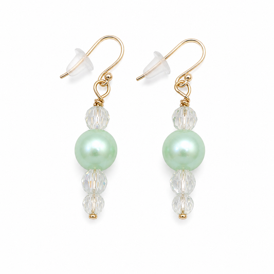 Mint green pearl drop earrings with clear crystal beads gold hooks handmade lightweight jewelry white background