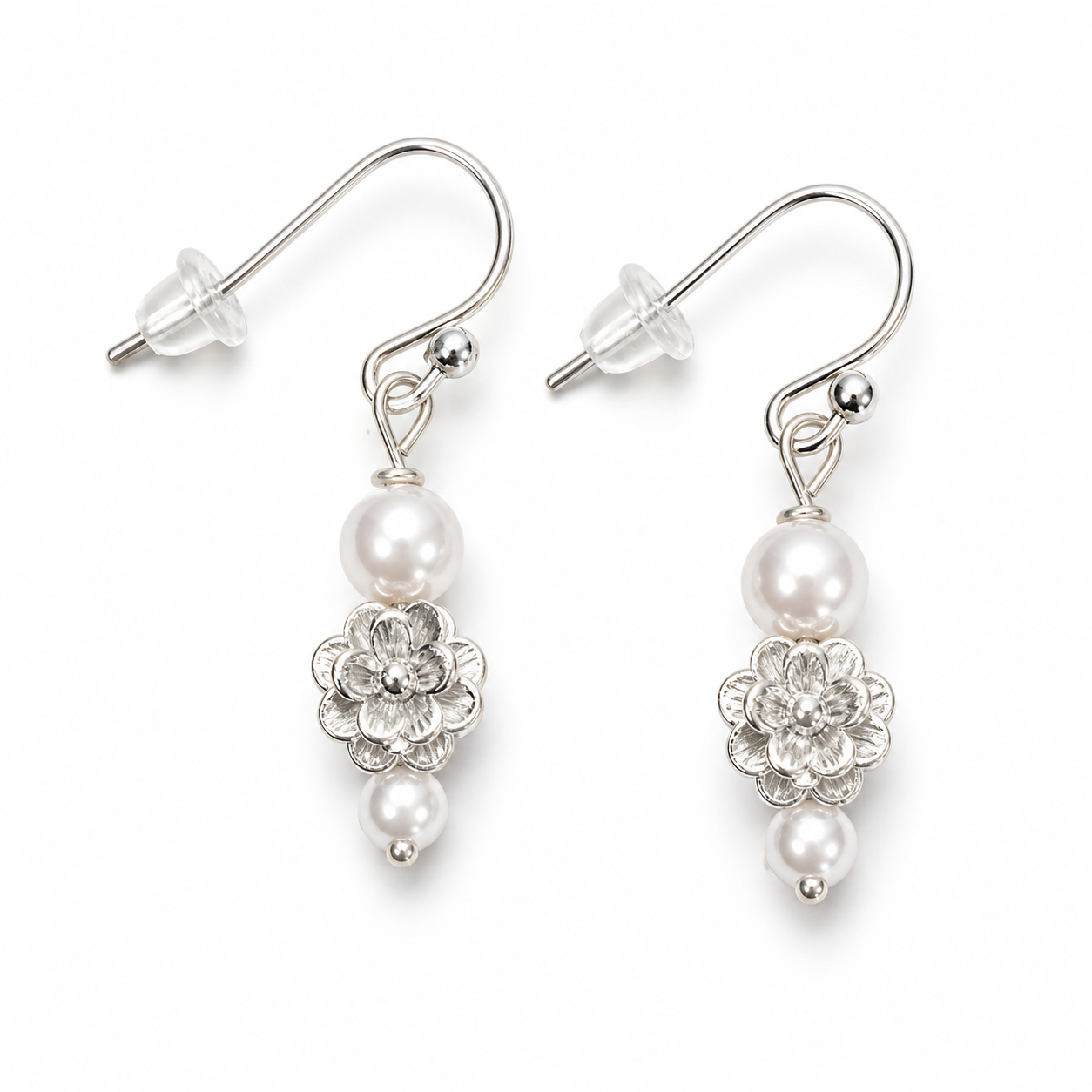 Silver floral pearl drop earrings with white beads lightweight handmade jewelry white background