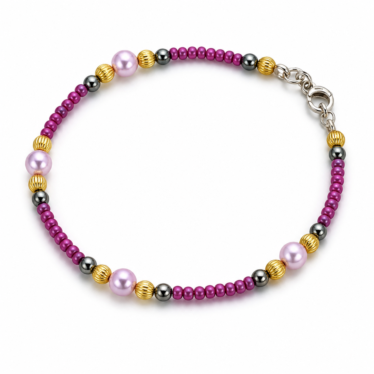 Purple beaded bracelet with pearl accents gold spacers and hematite beads handmade lightweight jewelry white background