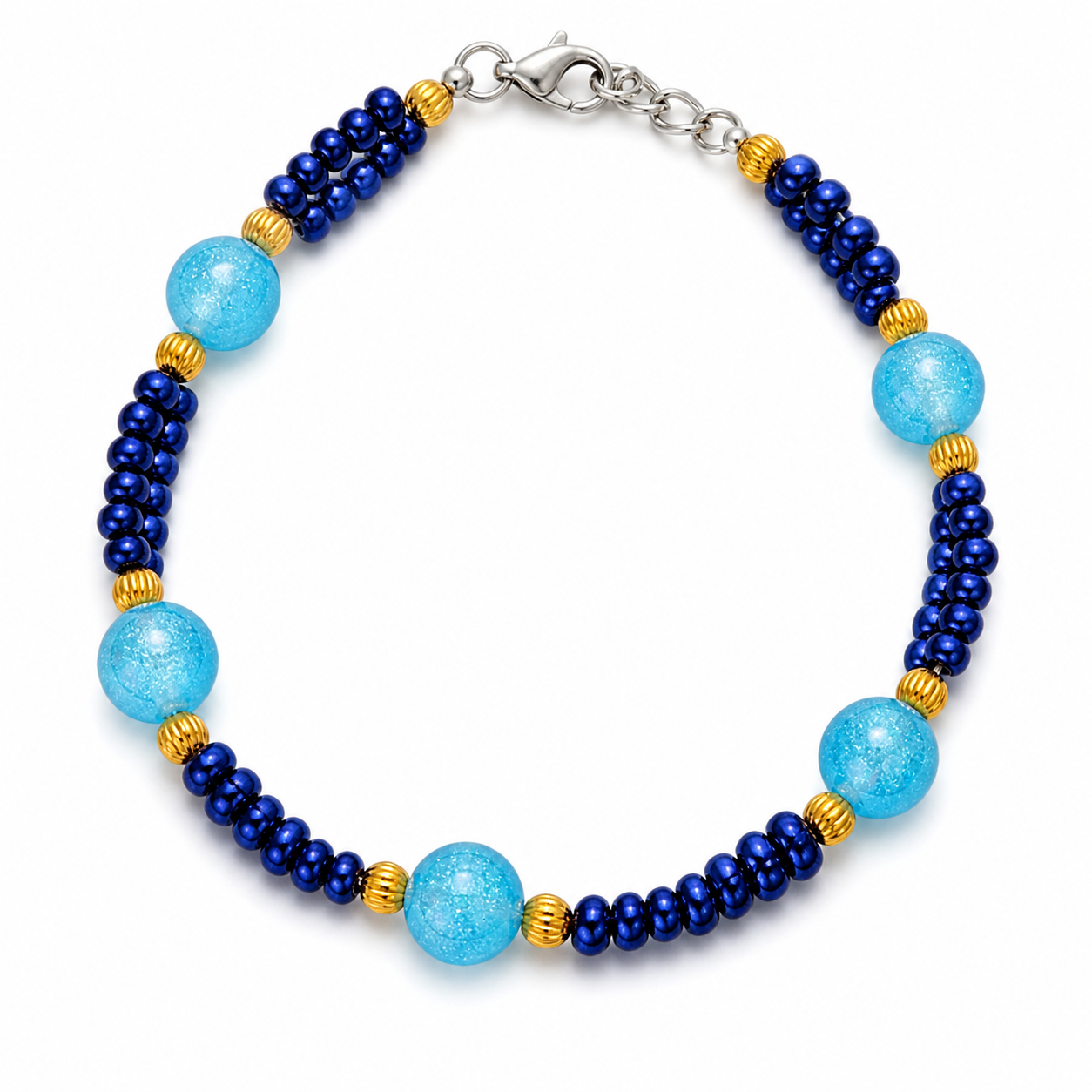 Blue and aqua beaded bracelet with gold spacers handmade lightweight jewelry white background