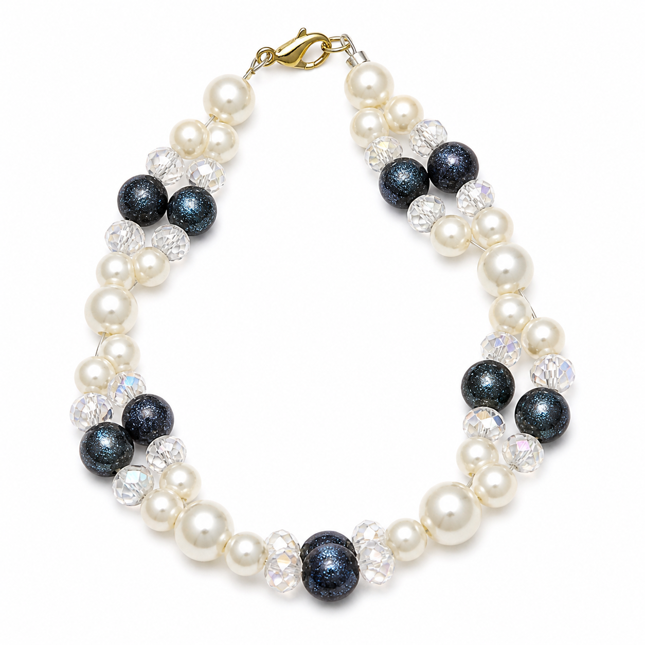 Pearl and crystal beaded bracelet with navy shimmer accents handmade lightweight jewelry white background