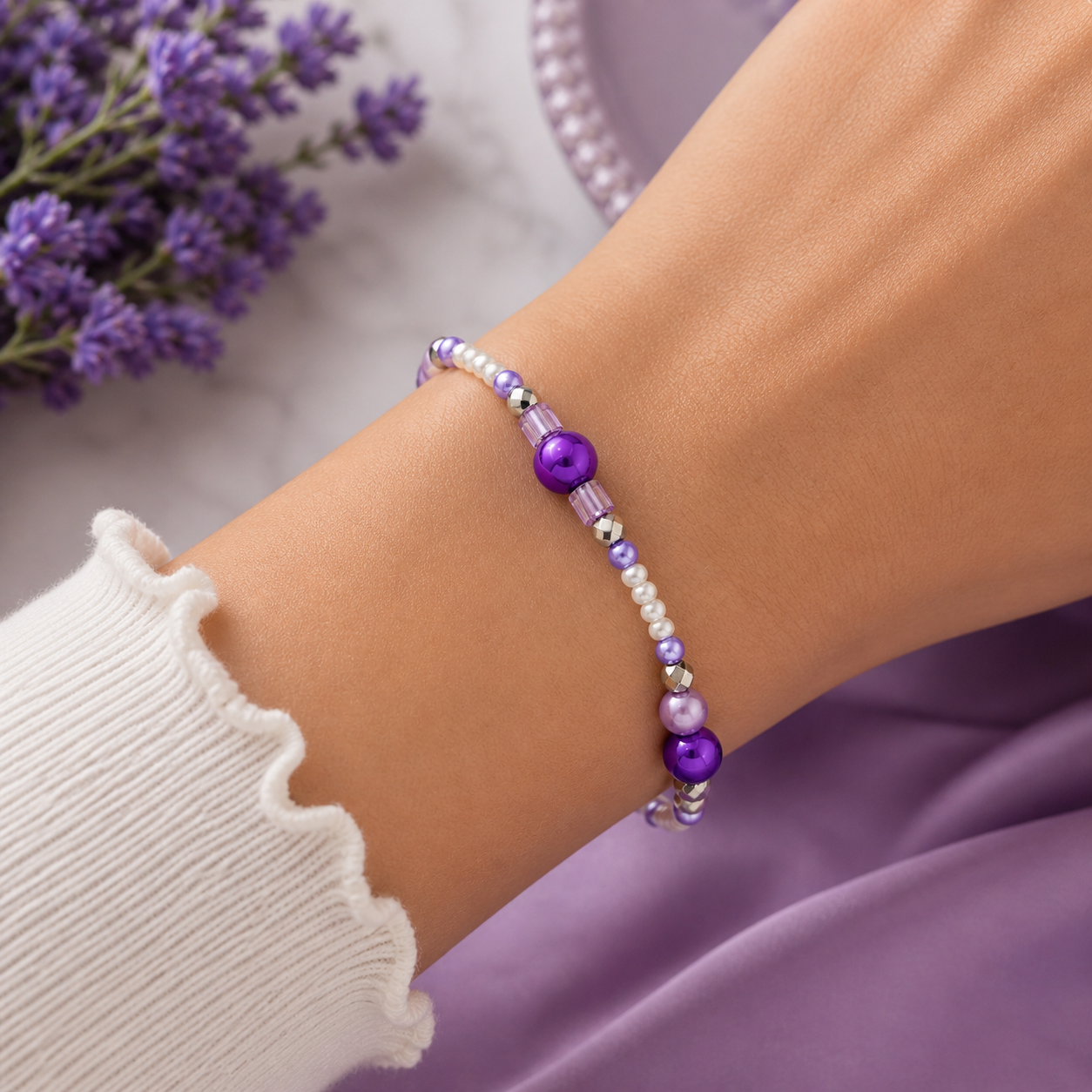 Woman wearing purple lavender pearl beaded bracelet close up elegant handmade jewelry